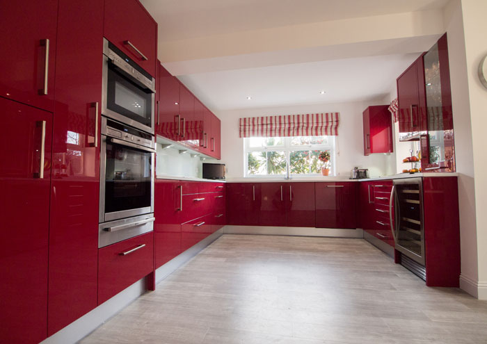 Red gloss kitchen in Southwater